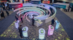 Rent2Way unique spiral trade show booth with interactive iPad kiosks and overhead branding